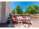 Cozy back deck area is furnished with comfortable seating and is perfect for relaxing at 10707 Jordan Ct, Parker, CO 80134