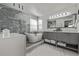 Gorgeous bathroom featuring a free-standing tub, walk-in shower, and double vanity at 10707 Jordan Ct, Parker, CO 80134