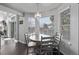 Dining area with chandelier, hardwood floors, and natural light at 10707 Jordan Ct, Parker, CO 80134