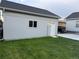 Exterior of detached garage, showcasing siding, roof, and grassy lawn at 2728 N Yates St, Denver, CO 80212