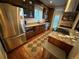 Modern kitchen with granite countertops, stainless steel appliances, and ample cabinet space at 2728 N Yates St, Denver, CO 80212