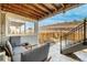 Cozy covered back patio perfect for relaxing and enjoying the outdoors at 11027 Sunshimmer Cir, Parker, CO 80134