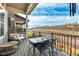Relaxing deck area features open sky view, outdoor seating and serene privacy fencing at 11027 Sunshimmer Cir, Parker, CO 80134