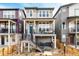 Charming two-story home with a welcoming front porch and landscaped yard at 11027 Sunshimmer Cir, Parker, CO 80134