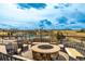 Outdoor fire pit area, with views and seating, perfect for relaxation at 11027 Sunshimmer Cir, Parker, CO 80134