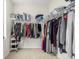Spacious walk-in closet with clothing racks and shelves for storage at 11027 Sunshimmer Cir, Parker, CO 80134