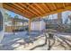 Enjoyable backyard area featuring a shed, woodpile and a wood pergola at 5927 S Kline St, Littleton, CO 80127