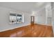 Spacious living room boasts vaulted ceilings, hardwood floors, large windows, and a welcoming atmosphere at 5927 S Kline St, Littleton, CO 80127