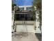 Inviting two-story townhome featuring an attached garage and charming balcony with wrought iron details at 935 N Pennsylvania St # 3, Denver, CO 80203