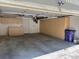 Spacious garage interior with built-in storage cabinets and ample room for parking and projects at 935 N Pennsylvania St # 3, Denver, CO 80203