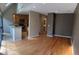 Open concept living space featuring hardwood floors and access to kitchen area at 935 N Pennsylvania St # 3, Denver, CO 80203