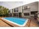 Community pool with a well-maintained deck, perfect for summer relaxation and social gatherings at 935 N Pennsylvania St # 3, Denver, CO 80203