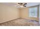 Simple bedroom with window blinds and ceiling fan at 11733 Elk Head Range Rd, Littleton, CO 80127