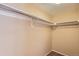 Spacious closet with double hanging rods and shelving at 11733 Elk Head Range Rd, Littleton, CO 80127