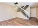 Dining area with hardwood floors and staircase to upper level at 11733 Elk Head Range Rd, Littleton, CO 80127