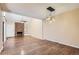 Bright living room with hardwood floors, fireplace and built-in shelving at 11733 Elk Head Range Rd, Littleton, CO 80127