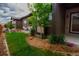 Landscaped backyard with gravel and a small tree at 11860 Sandcastle Ct, Parker, CO 80138