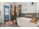 Relaxing bathroom with a modern soaking tub, glass shower, and a spa-like ambiance at 10961 Main Range Trl, Littleton, CO 80127
