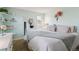 Serene bedroom featuring a calming color scheme, soft bedding, and plenty of natural light at 10961 Main Range Trl, Littleton, CO 80127