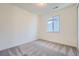 Cozy bedroom with carpet floors, natural light, and a neutral color scheme at 3147 S Russell St, Morrison, CO 80465