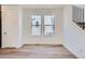 Bright bedroom with natural light, hardwood floors, and a neutral color scheme at 3147 S Russell St, Morrison, CO 80465