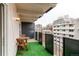 Inviting balcony with seating offers a pleasant outdoor retreat and city views at 1265 Race St # 408, Denver, CO 80206