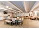 Large basement with open layout, dining area, lounge, and billiards for recreation at 1265 Race St # 408, Denver, CO 80206