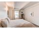 Bright bedroom boasts ample natural light, neutral tones, and stylish accents for a cozy, inviting atmosphere at 1265 Race St # 408, Denver, CO 80206