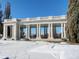 Classic Cheesman Park pavilion featuring grand columns, set against a backdrop of snowy landscapes and mountain vistas at 1265 Race St # 408, Denver, CO 80206