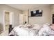 Bedroom featuring neutral colors, including carpet, walls, and bedding at 6711 Fraser Cir, Frederick, CO 80530