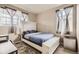 Bedroom with mini fridge and black out curtains at 6711 Fraser Cir, Frederick, CO 80530