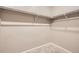 Walk-in closet featuring white shelving at 6711 Fraser Cir, Frederick, CO 80530