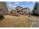 Expansive backyard with a large wooden deck, great for outdoor entertaining and gatherings at 10358 Kelliwood Way, Highlands Ranch, CO 80126