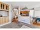 Open-concept view showcasing the kitchen, dining area, and staircase, perfect for modern living at 10358 Kelliwood Way, Highlands Ranch, CO 80126