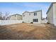 Backyard with a white fence and space for activities at 4865 Gibraltar St, Denver, CO 80249