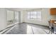 Cozy dining area with sliding glass doors and wood-look flooring, perfect for casual meals at 4865 Gibraltar St, Denver, CO 80249