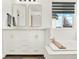 Modern bathroom features a double sink vanity, soaking tub, and elegant fixtures at 718 Fairhaven St, Castle Rock, CO 80104