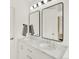 Bathroom featuring a double sink vanity with marble countertop at 718 Fairhaven St, Castle Rock, CO 80104