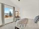 Bright bedroom featuring a large window with neighborhood views and neutral decor at 718 Fairhaven St, Castle Rock, CO 80104