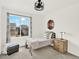 Bedroom with a large window that fills the space with natural light at 718 Fairhaven St, Castle Rock, CO 80104
