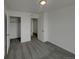 This bedroom offers neutral walls and carpet, creating a calm and soothing space at 12892 E 99Th Pl, Commerce City, CO 80022