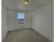 Carpeted bedroom featuring neutral colors, one window, and crisp white paint at 12892 E 99Th Pl, Commerce City, CO 80022