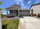 Charming single-Gathering home featuring a welcoming front porch and a two-car garage at 12892 E 99Th Pl, Commerce City, CO 80022