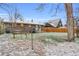 Spacious backyard featuring a patio area perfect for outdoor dining and relaxation, with a partially snow-covered lawn at 9360 Lowell Blvd, Westminster, CO 80031
