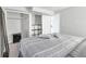 Bedroom featuring neutral decor, closet, and a side table at 9360 Lowell Blvd, Westminster, CO 80031