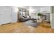 Bright living room featuring hardwood floors and a cozy stone fireplace at 9360 Lowell Blvd, Westminster, CO 80031