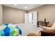 Versatile basement space with neutral paint, plush carpet, offering flexibility for various uses at 13034 Bridge View Ln, Parker, CO 80134