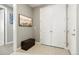 Cozy entryway with bench storage and artwork at 13034 Bridge View Ln, Parker, CO 80134