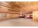 Finished basement providing wood walls, recessed lighting, and carpeted floor at 85 Revett Dr # 66, Breckenridge, CO 80424