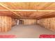 View of the large basement offering wood walls and ceilings plus comfortable carpeting at 85 Revett Dr # 66, Breckenridge, CO 80424